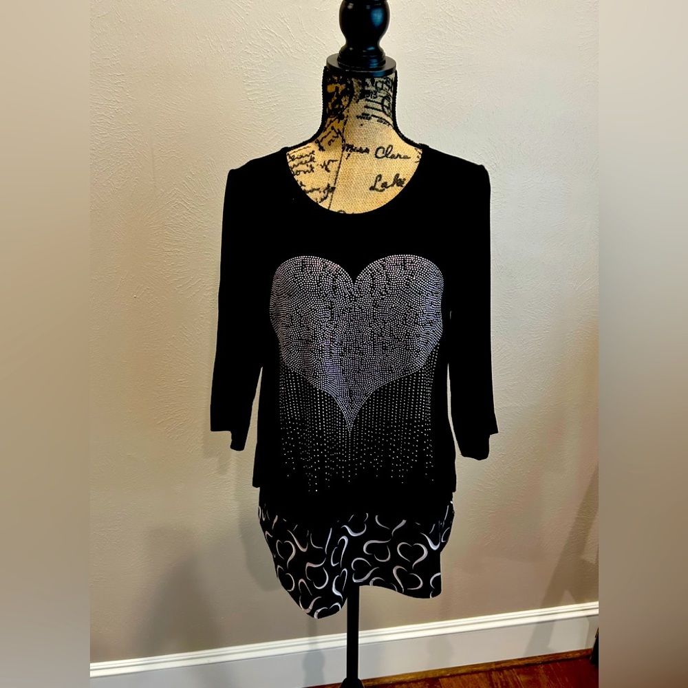Tricotto sparkly heart top with heart fabric underlay. Vent in back size S